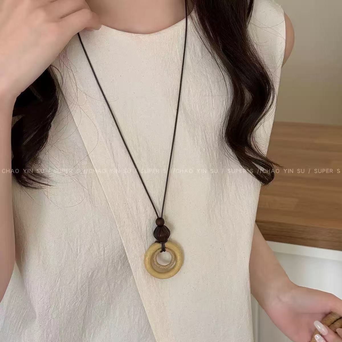 Bohemian Ethnic Long Necklace For Women Featuring Wood Carving Pendant On Cord String