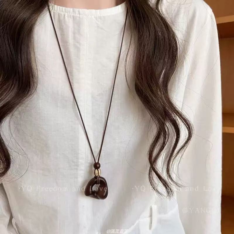 Bohemian Ethnic Long Necklace For Women Featuring Wood Carving Pendant On Cord String