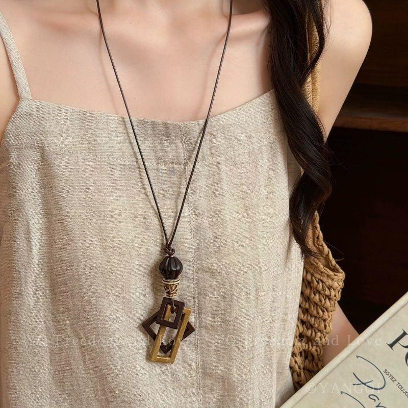 Bohemian Ethnic Long Necklace For Women Featuring Wood Carving Pendant On Cord String