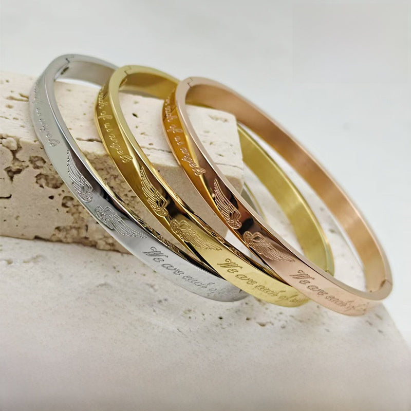 Classic Style Wings Titanium Steel Bangle For Women In Gold