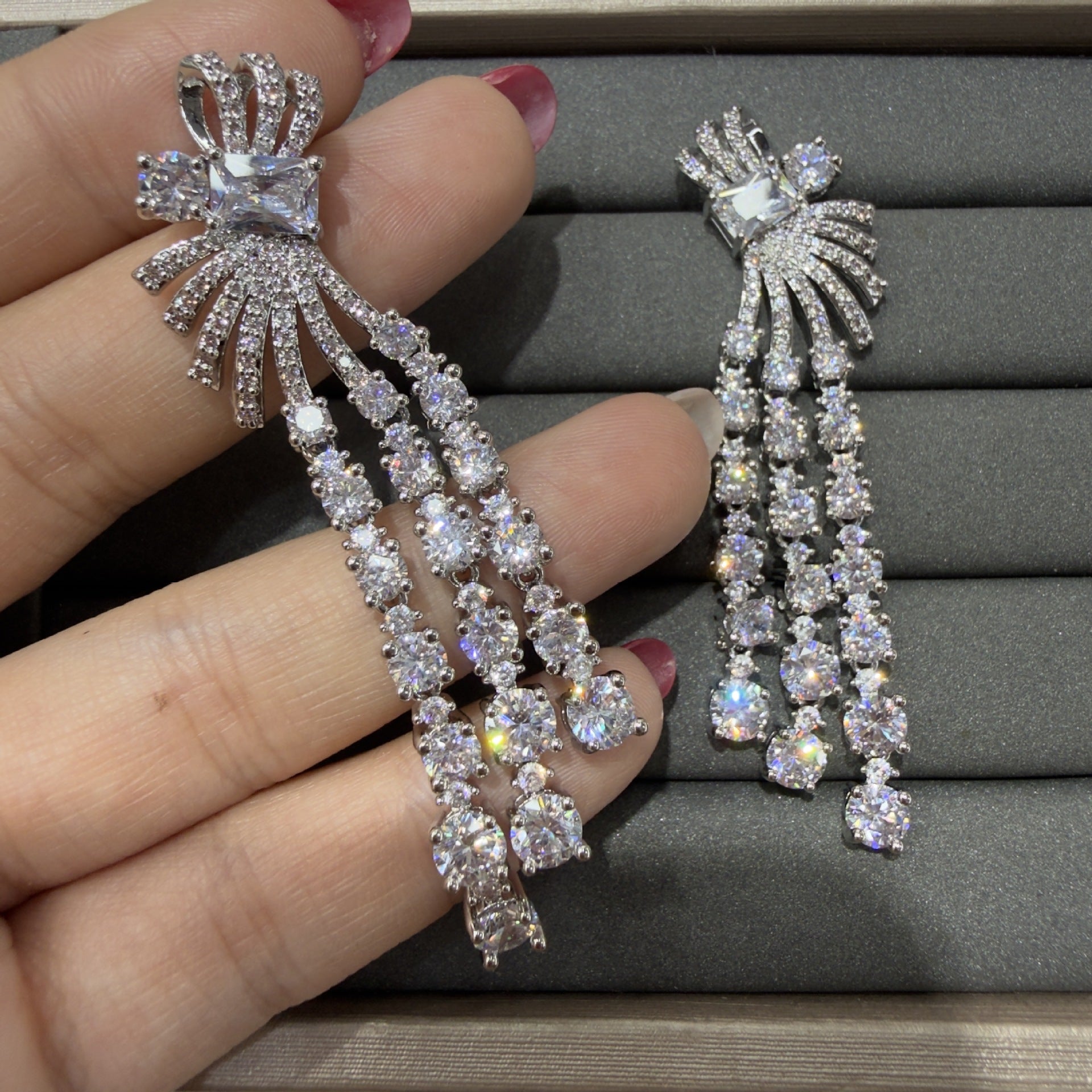 Bow Tie Tassel Earrings For Women In Silver Featuring 925 Sterling Silver Ear Pins And Copper Material