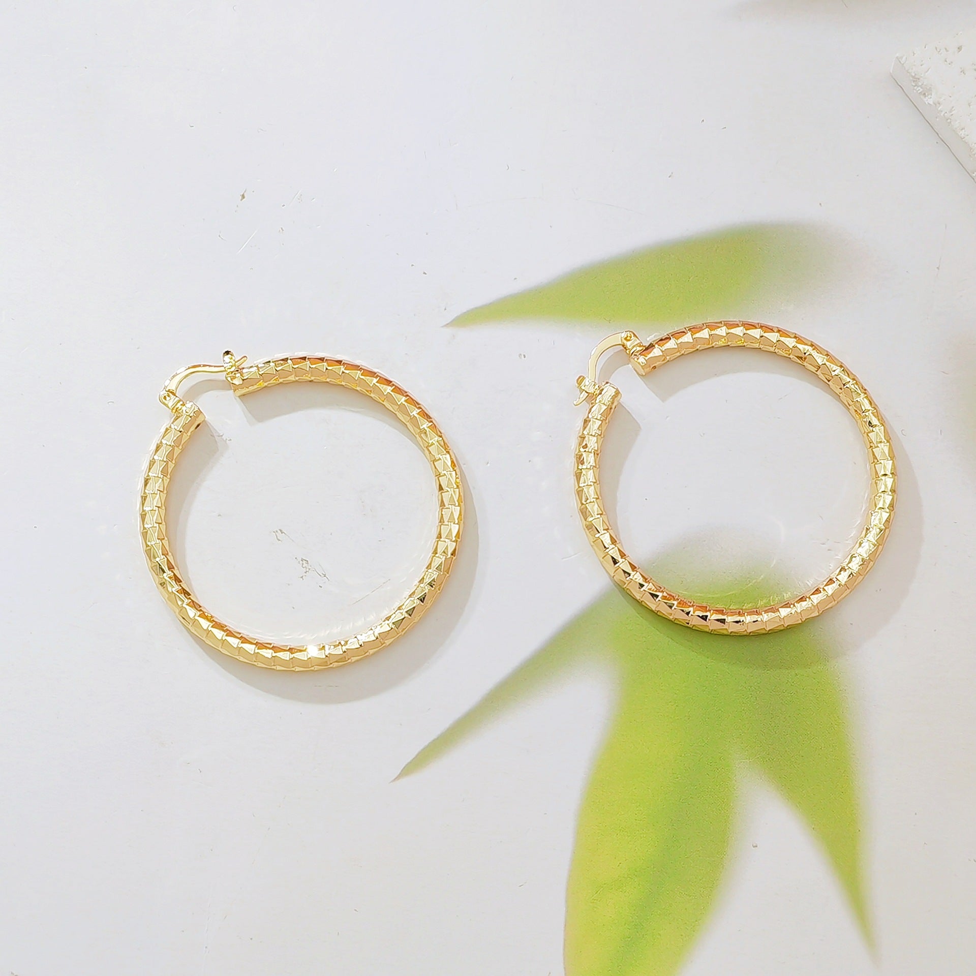 Litmus Large Round Earrings For Women In Gold Alloy Featuring Copper Ear Pins