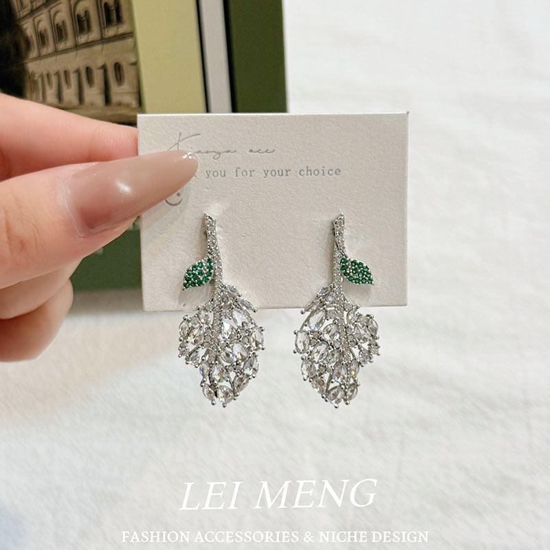 Elaborate Leaves Earrings For Women In Green Copper With Rhinestones, Featuring An Exaggerated Style