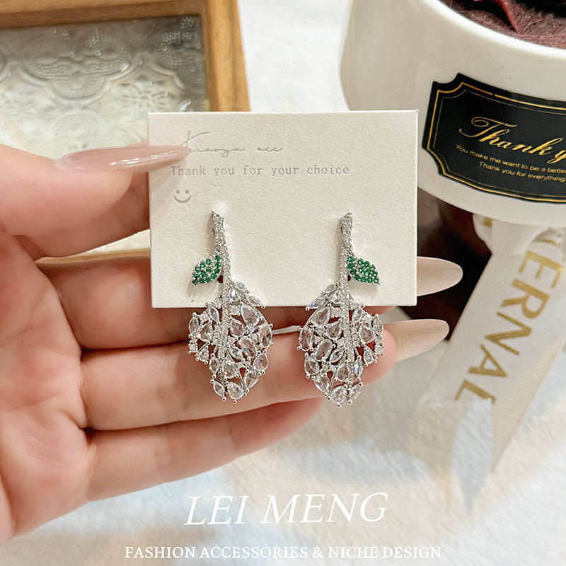 Elaborate Leaves Earrings For Women In Green Copper With Rhinestones, Featuring An Exaggerated Style