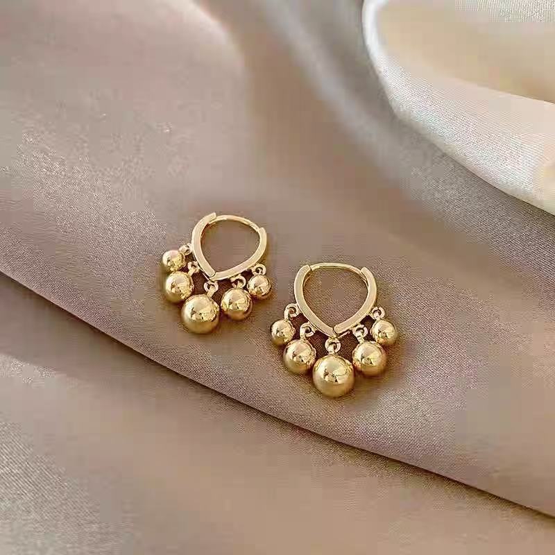 Novelty Circle Tassel Earrings For Women In Gold Zinc Alloy Featuring Unique Design