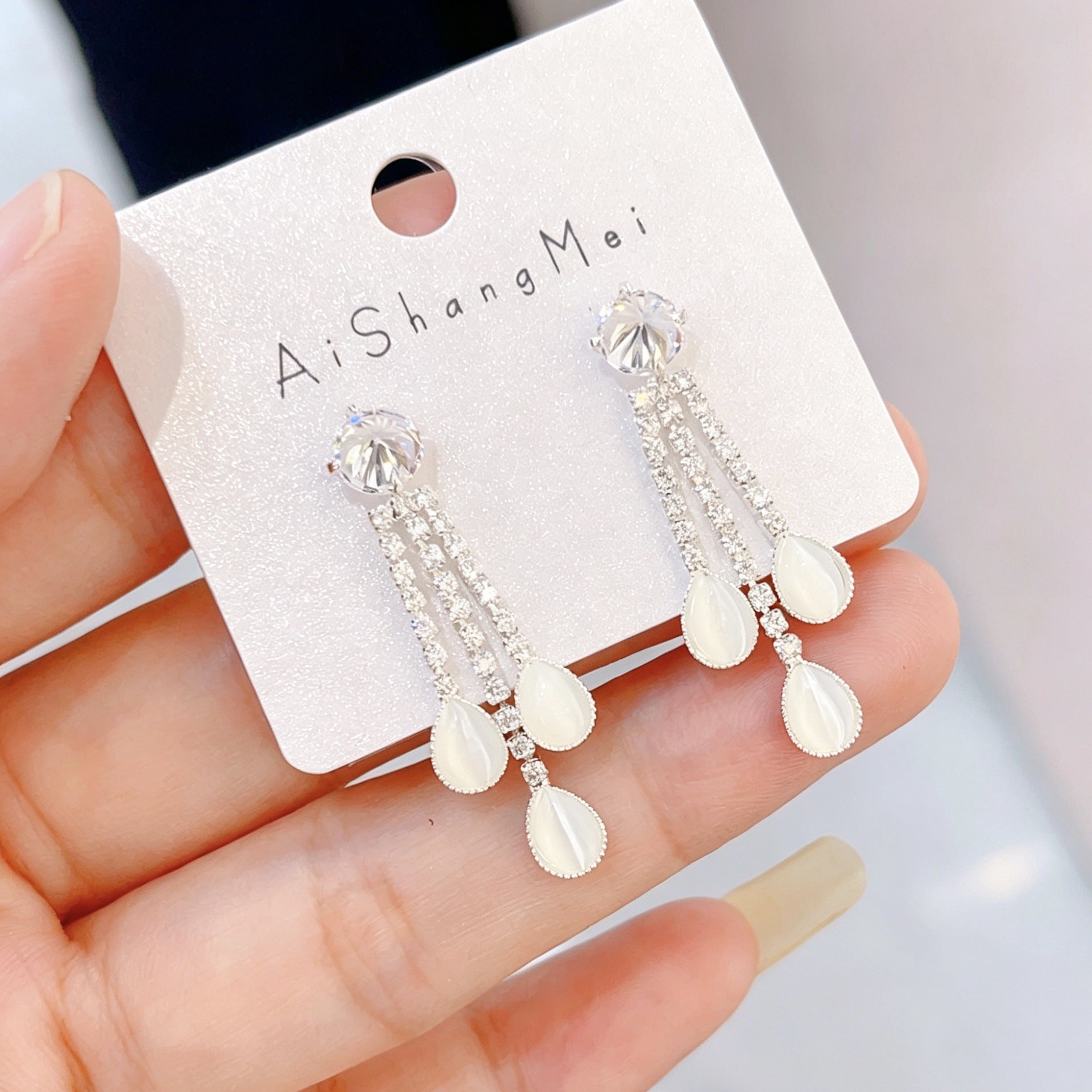 Bow Tie Tassel Earrings For Women In Copper With Real Gold Plated Finish And Zircon Inlay