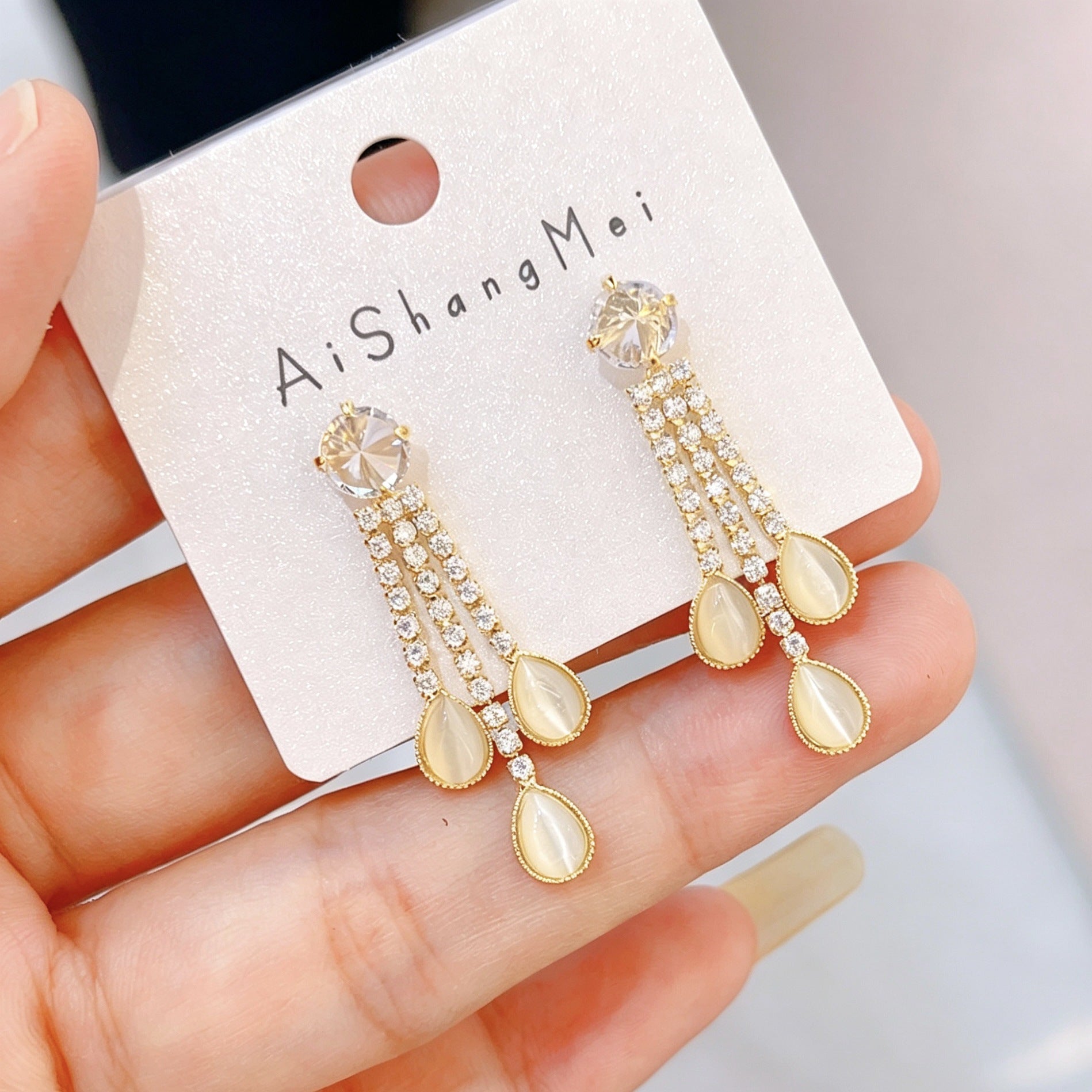 Bow Tie Tassel Earrings For Women In Copper With Real Gold Plated Finish And Zircon Inlay