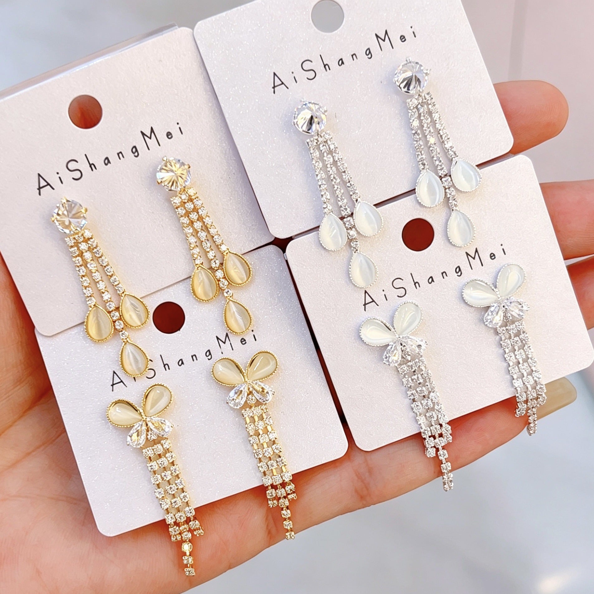 Bow Tie Tassel Earrings For Women In Copper With Real Gold Plated Finish And Zircon Inlay