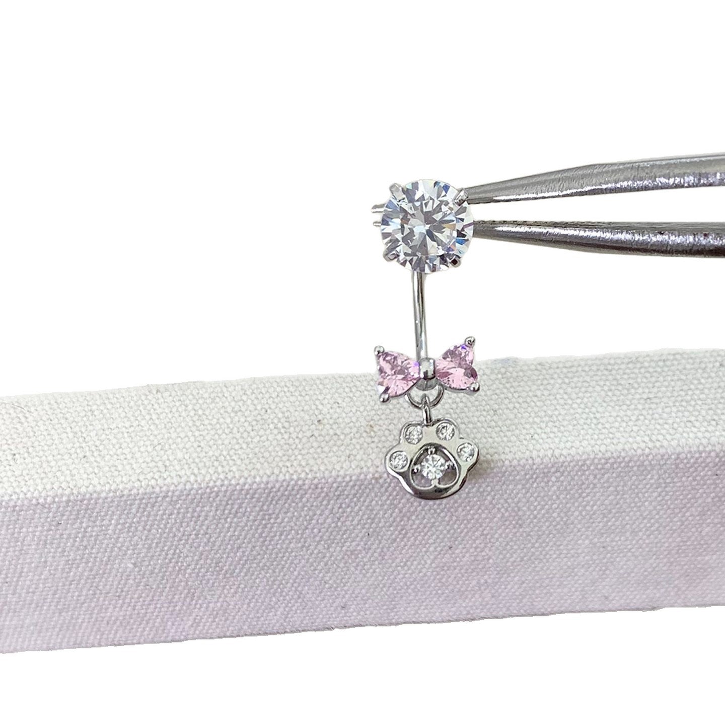 Bow Tie Earrings In Titanium Steel With Zircon Inlay, Featuring 316L Stainless Steel Posts, Unisex Design In Natural Pink