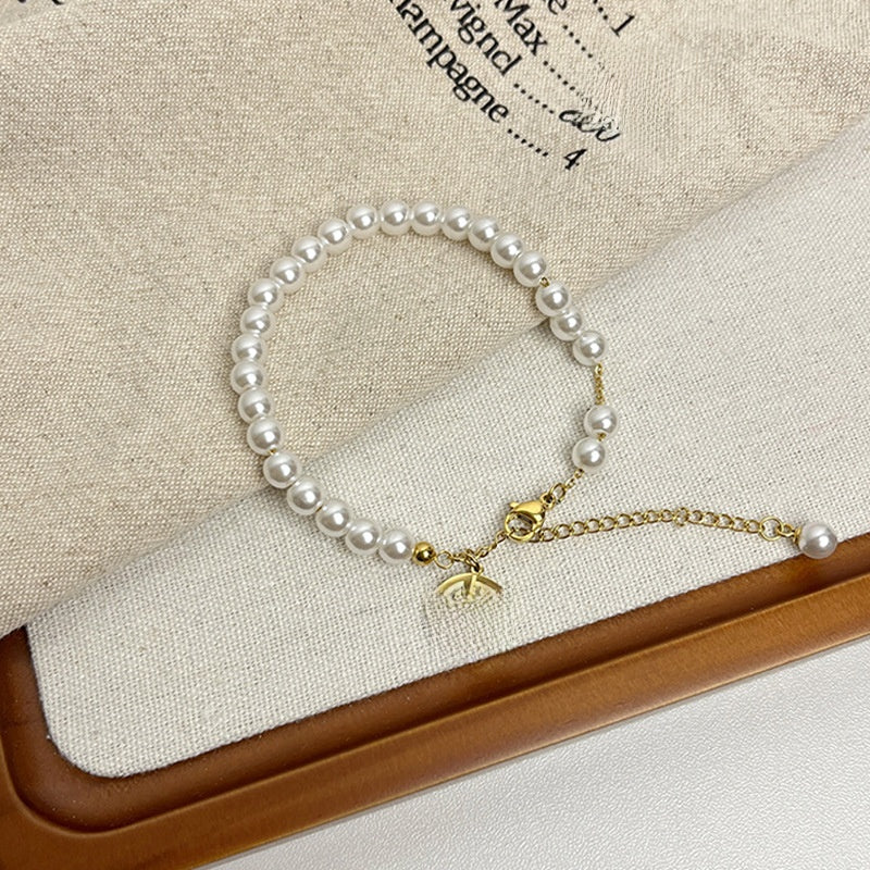 Leaf Pattern Women’s Bracelet In Titanium Steel With 18K Real Gold Electroplated Finish, Available In Gold
