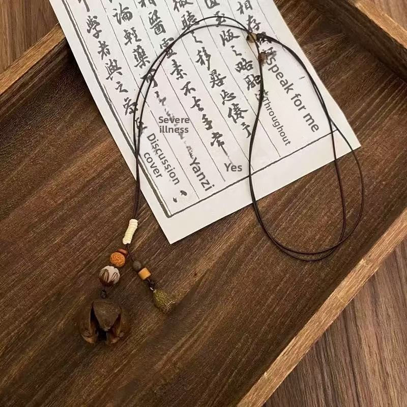 Bohemian Ethnic Long Necklace For Women Featuring Wood Carving Pendant On Cord String